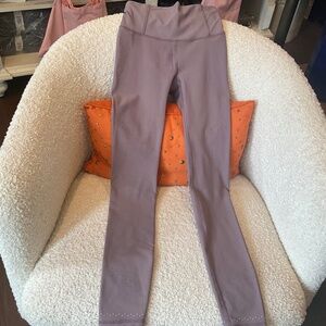 Lululemon Zoned in  Running High Rise Tight 27”, Color  Lilac , Size 4